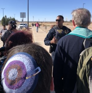 Talking with DHS officer at the Tornillo child detention camp